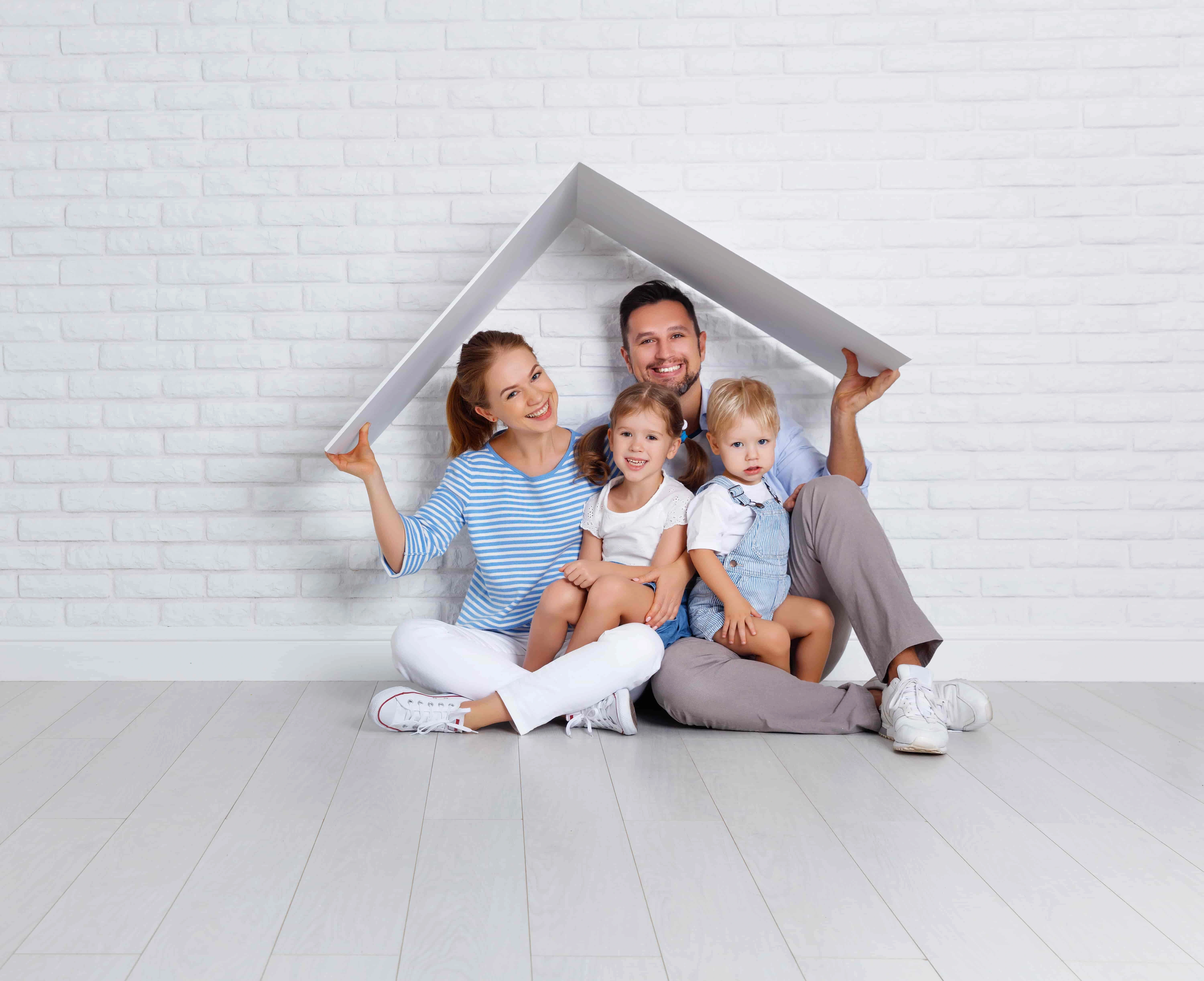 Today Cash hero banner depicting a happy family sitting under a roof.